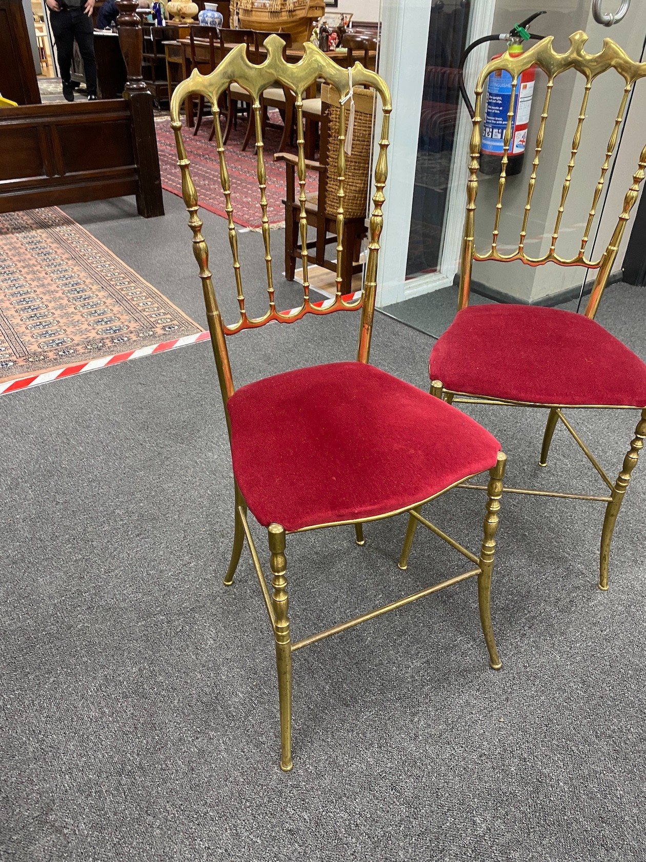 A pair of brass Chiavari bedroom chairs